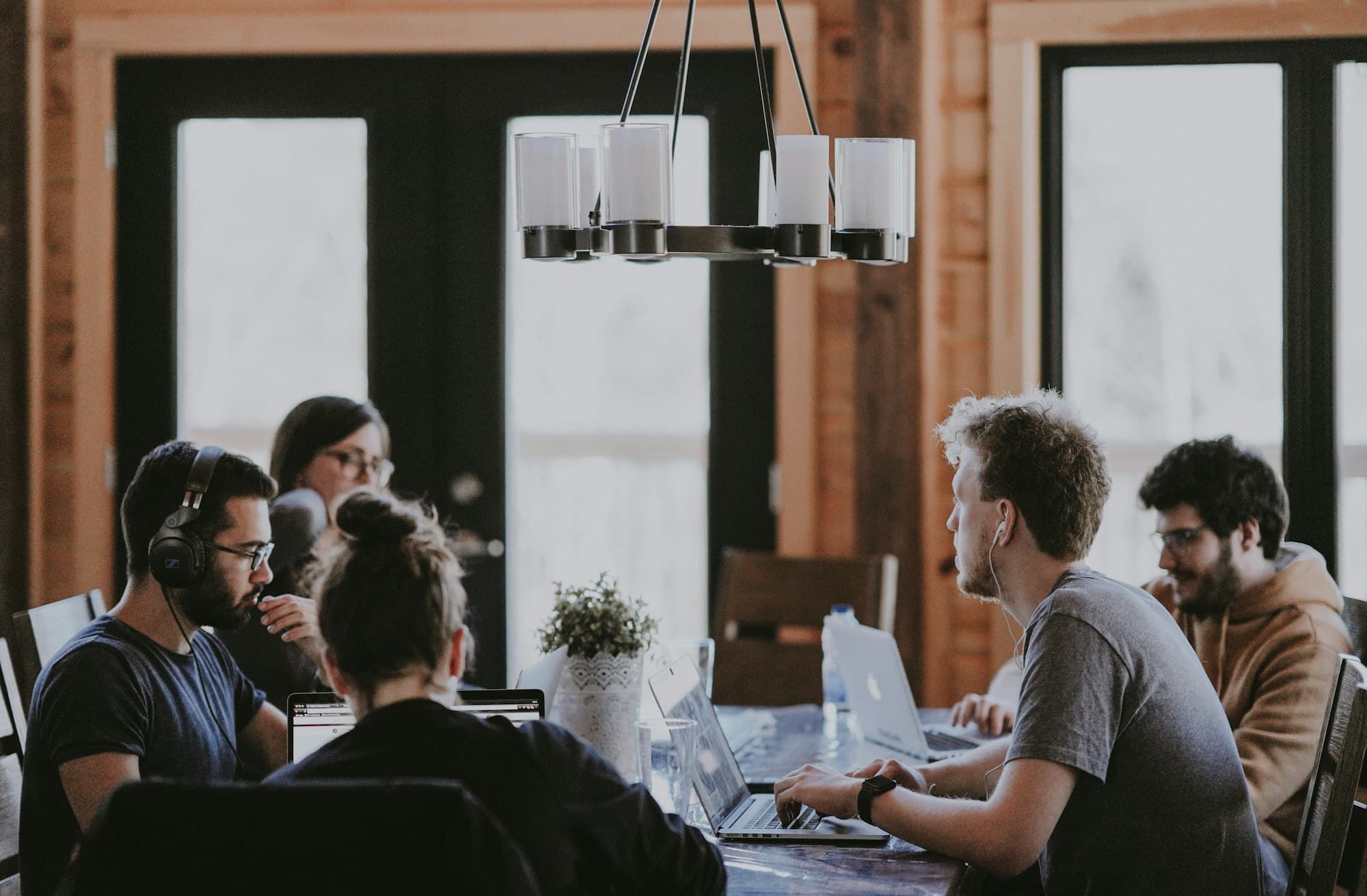 Small team discussing a project around a table